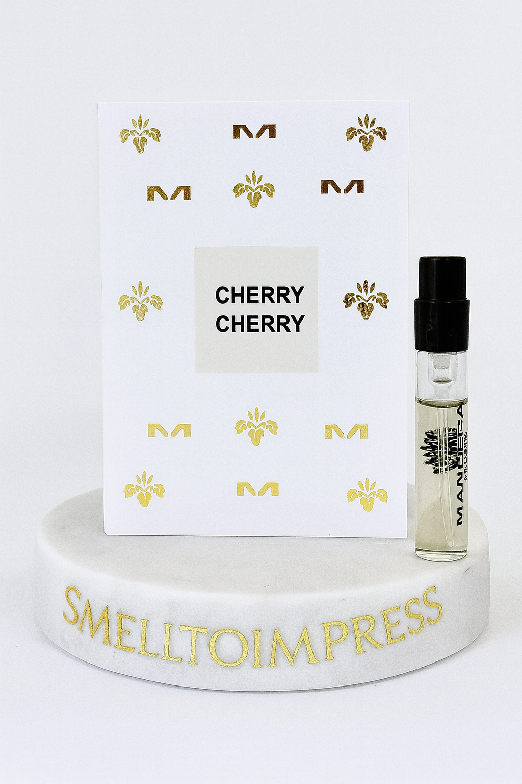 MANCERA Cherry Cherry Eau de Parfum 0.06 fl. oz. 2 ml official perfume sample on smelltoimpress luxury marble stand